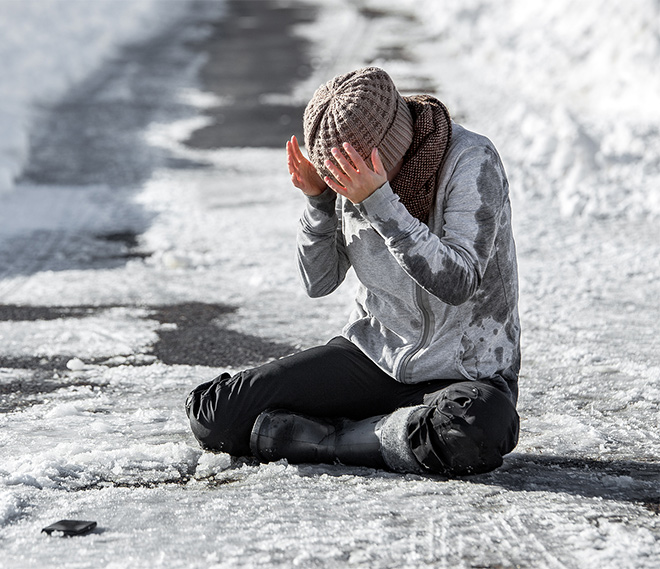 woman slip and fall in the snow personal injury